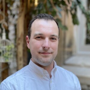 Profile picture of Chris Chisman wearing a white shirt.